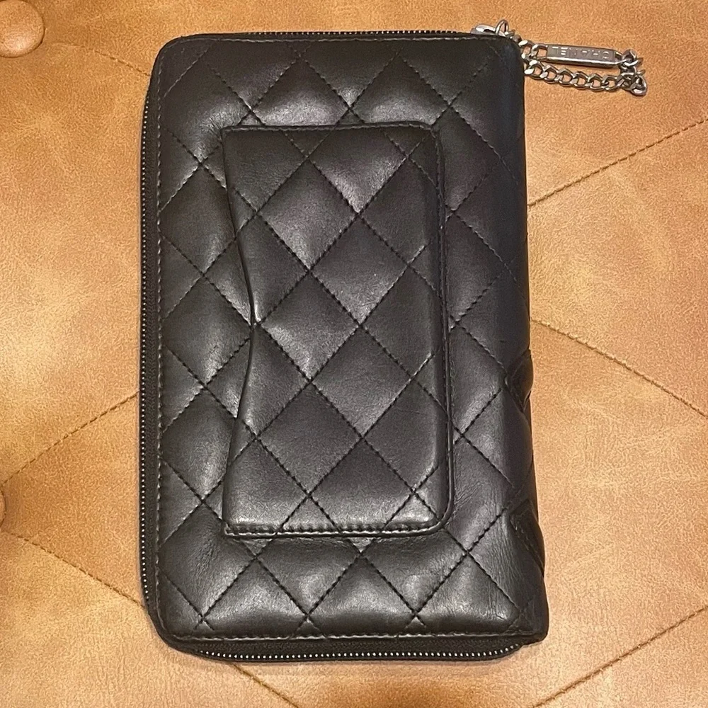 CHANEL Black Quilted CC Zip-Around Wristlet Clutch